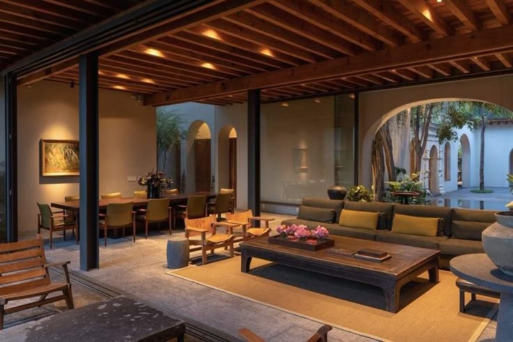 An impressive luxury property bathed in natural light, highlighting its grand scale.
